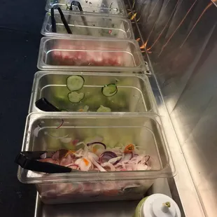 Toppings and salsas available for you to add to taste next to the pickup window.