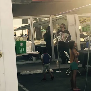 There's an accordion player today! Not sure if he's a regular or what but it was a nice touch today. :)