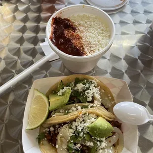 Elotes in cup, 2 tacos