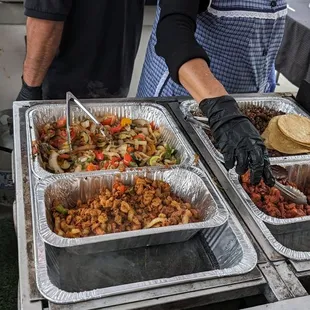 Fajita veggies, chicken, carne asada, and al pastor