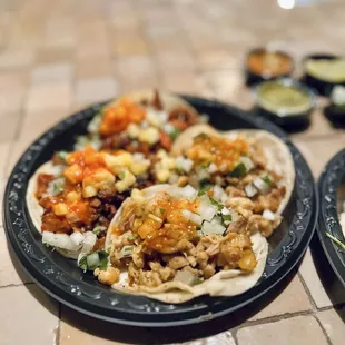 Pollo and Al Pastor tacos