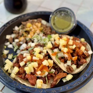 two pastor + asada tacos