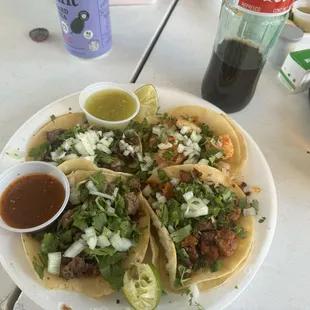 asada (steak), camarón (shrimp), cachete (beef cheek), and adobada (marinated pork) tacos