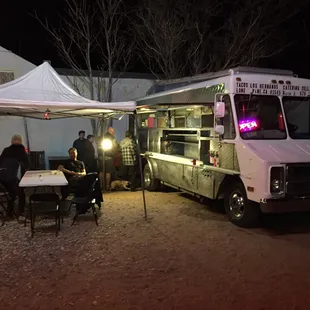 Look for this truck and table on the corner diagonally across from the Mobile station.