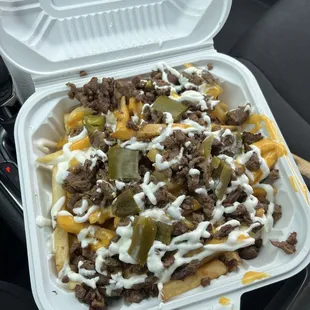 a takeout container of food