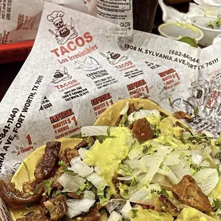 Tripas dorado y al pastor tacos