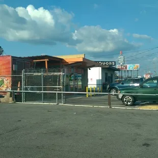 a taco truck parked in front of a restaurant