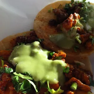 Pork tacos with pineapple and cilantro