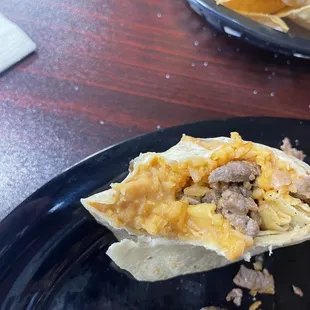 Carne Asada burrito with over cooked rice.
