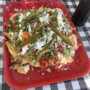 Nachos de pollo algo bien en tacos los primos del sur