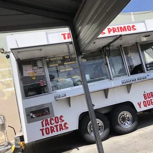 a taco truck parked in a parking lot