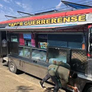 Taco truck at 11:45 am. Still warming up the grill and getting ready to serve lunch