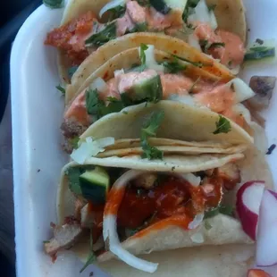 Chicharon, carnitas y pollo tacos