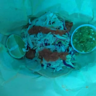 2 tacos de camarón en la comprá. Y una soda gratis por el día de hoy lunes