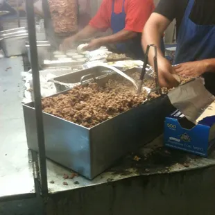 First on the assembly line: taco guy.