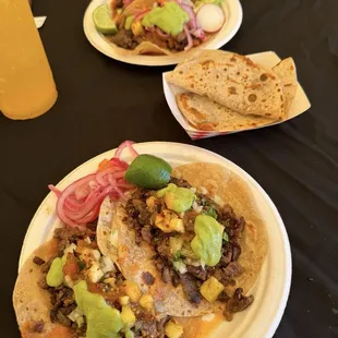 Two carne asada tacos and the secret bonata