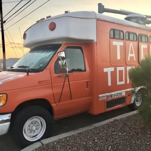 a taco truck parked in a parking lot