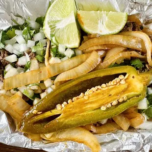 Carne Asada &amp; Al Pastor Tacos with grilled onions &amp; jalapeño