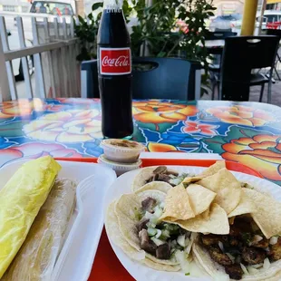 Cheese and jalapeño tomale, chicken tomale, lengua tacos, tripa taco &amp; a buche taco.