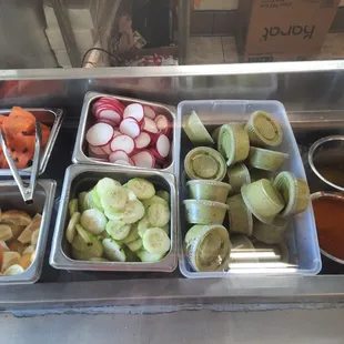 The condiment bar full.