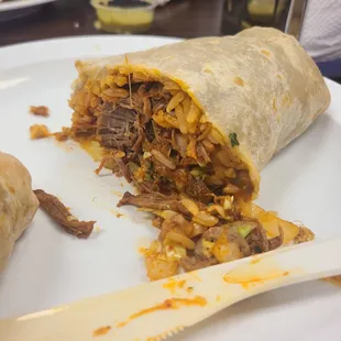 Half of Barbacoa burrito