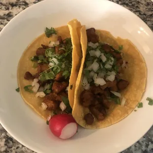 two tacos on a plate