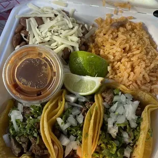 3 asada taco plate.  Pinto beans and rice is quality