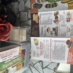 menus and prices on a table