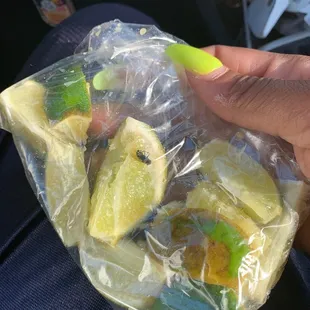 This was the nasty shit that was in my bag of limes a hate places that have there sides for tocos just open an not covered