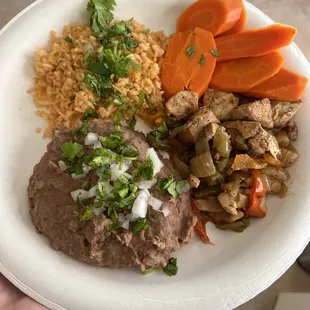 Tofu fajitas, rice and beans, and spicy carrots...all leftover from my party! It looked even better the day before