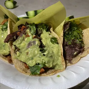 Al pastor, Campechano (steak and chorizo), and cabeza taco