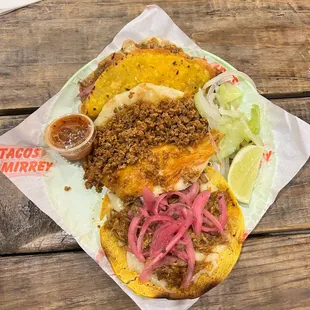 a plate of food on a wooden table