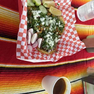 Two pollo and one birria taco with Consome