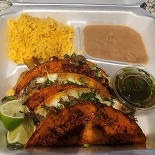 Moreno tacos with rice and beans.