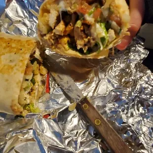 All the greatness of rice, beans, cheese, sour cream, lettuce, and tomatoes.