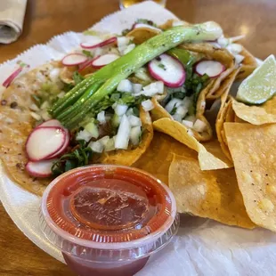 Two chicken tacos and one pork