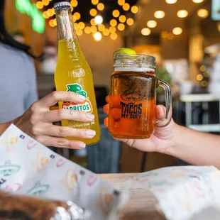 Pineapple jarrito and beer.