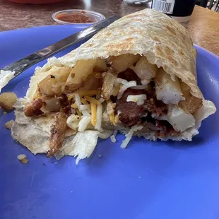 Bacon uncooked potato cheese burrito  ugh!!!