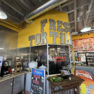 a taco stand in a restaurant