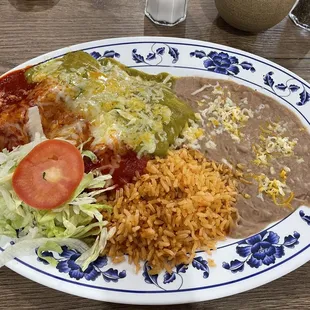 Chicken and Cheese Enchiladas plate with rice and beans