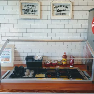 a counter with a variety of food items