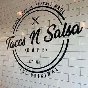 the logo on the wall