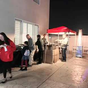 a group of people standing in line