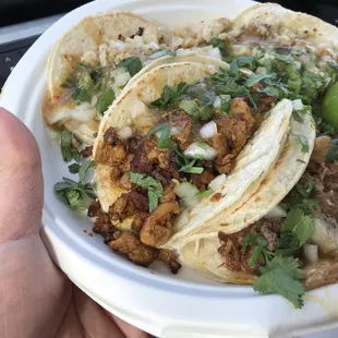 Fish, al pastor, and carnitas tacos