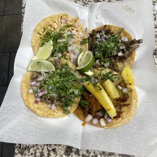 two tacoss on a plate
