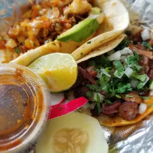 Neza taco(with shrimp and chorizo) and carnitas taco.