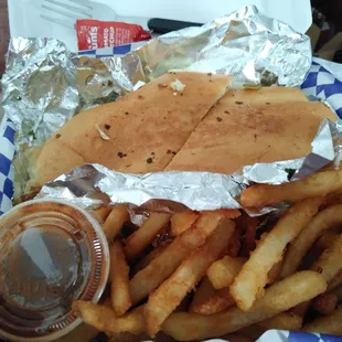 El Chapo torta - steak and chorizo, cheese, avocado, lettuce, mayo, and jalapeno with fries on the side