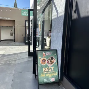 a sign outside a restaurant