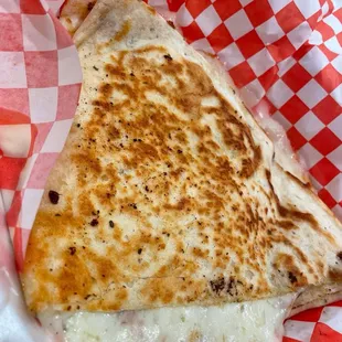 Giant quesadilla with extra cheese