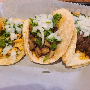 Pollo, lengua and brisket tacos.